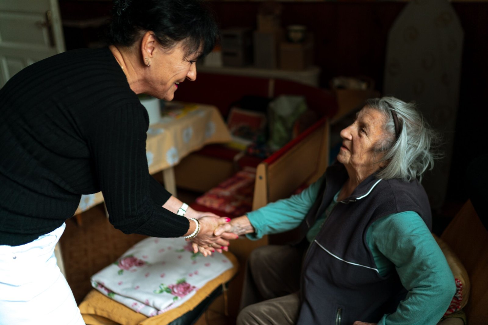 Companion driver greeting an elderly woman for a companion driving service in Frankston